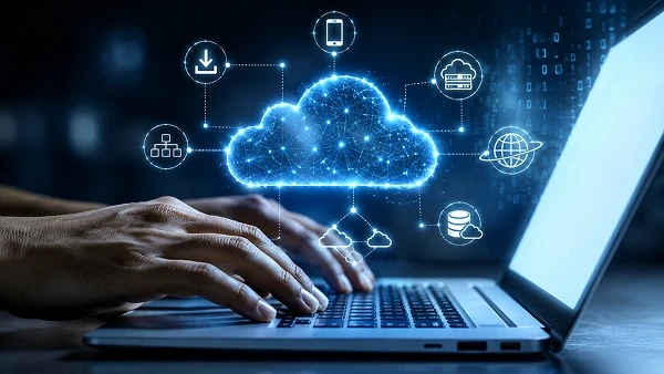 A connected cloud network running above a working laptop